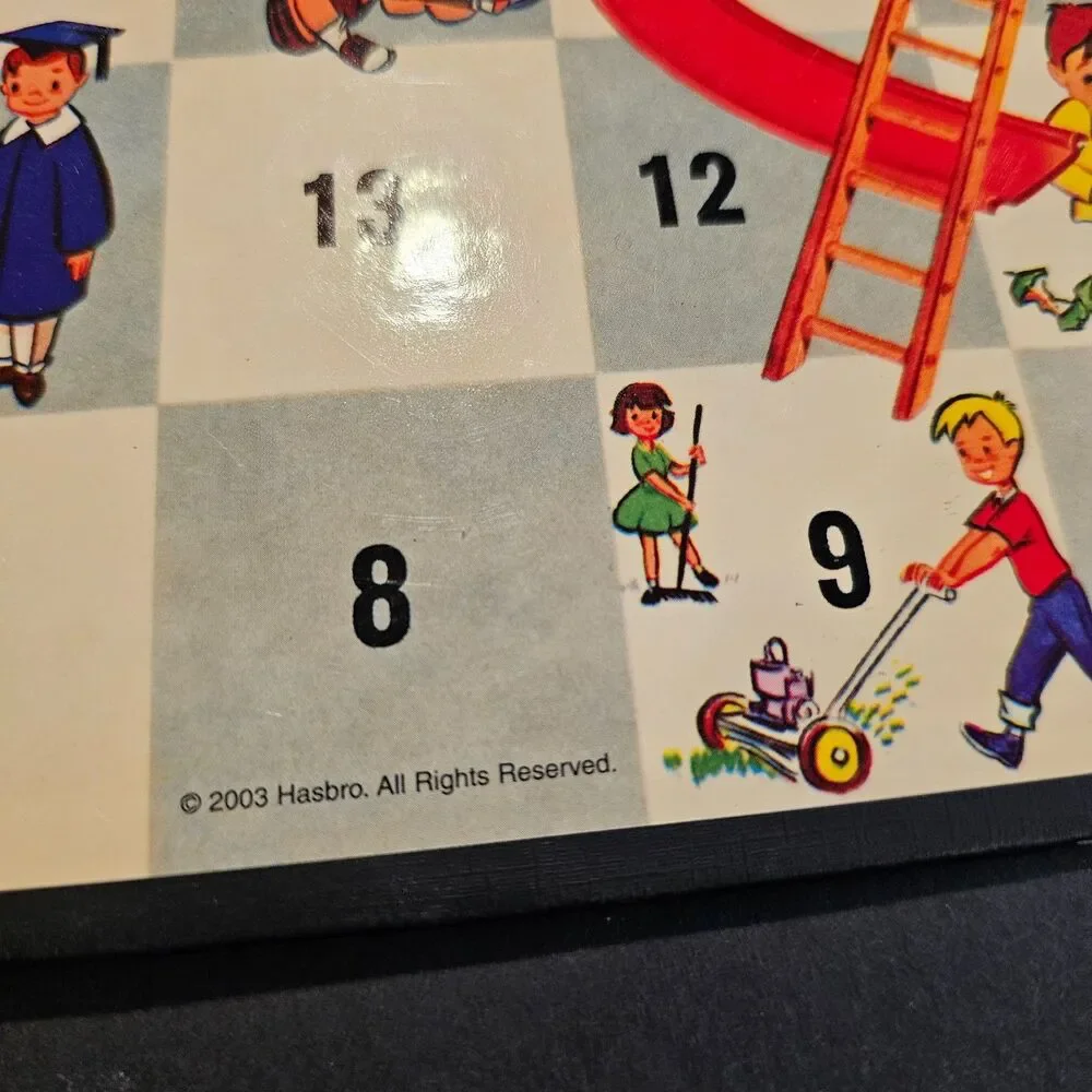 Chutes and Ladders Collector's Series Milton Bradley Board Game in Tin Case 2003